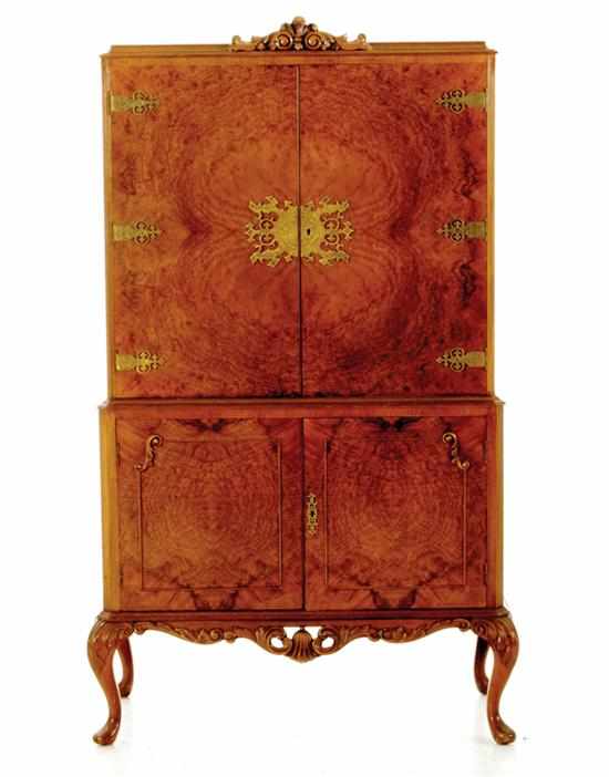 Appraisal: Queen Anne style walnut cocktail cabinet early th century molded