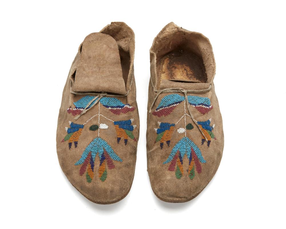 Appraisal: A pair of Plains Indian beaded hide moccasins Late th