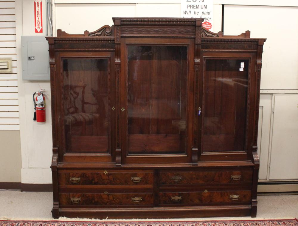 Appraisal: VICTORIAN WALNUT BREAKFRONT CABINET BOOKCASE ON CHEST Renaissance Revival design