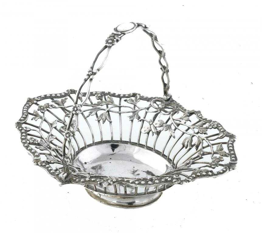 Appraisal: A GEORGE III SHAPED OVAL WIREWORK SWEETMEAT BASKET applied with