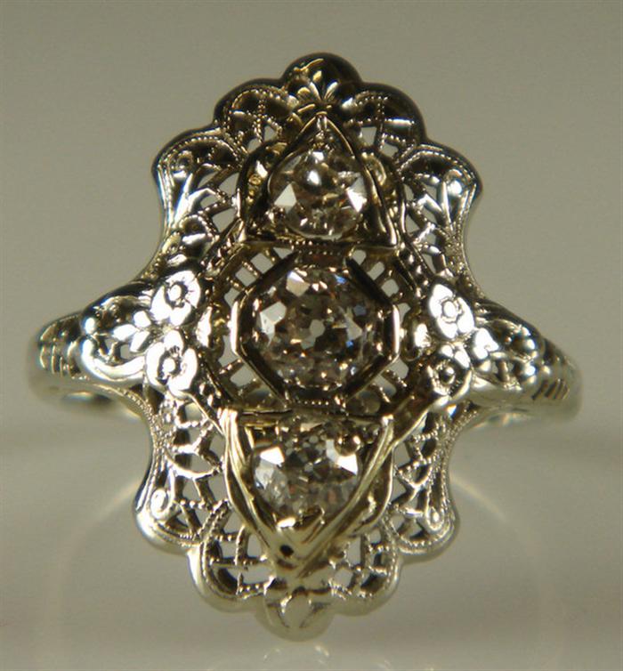 Appraisal: K WG filigree diamond cocktail ring diamonds about pts tdw