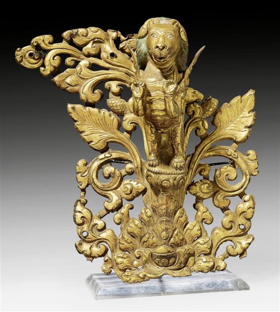 Appraisal: A GILT COPPER REPOUSS LION EMERGING FROM LOTOS SCROLLS Tibet