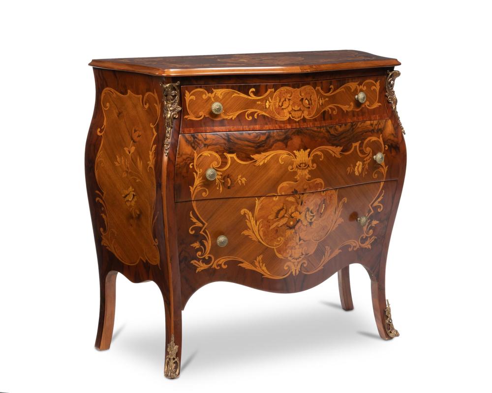 Appraisal: A Continental Rococo-style walnut bombe commode th century With a