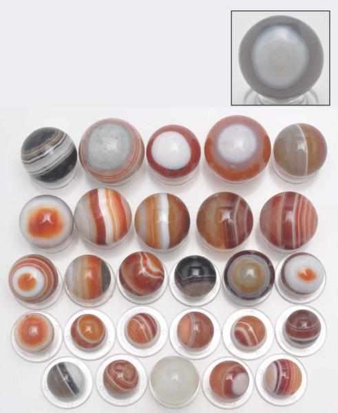 Appraisal: Lot of Bullseye Agate Marbles Description Includes all hand faceted