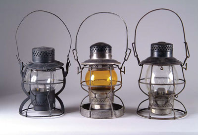 Appraisal: LOT OF RAILROAD LANTERNS Three kerosene lanterns one with yellow