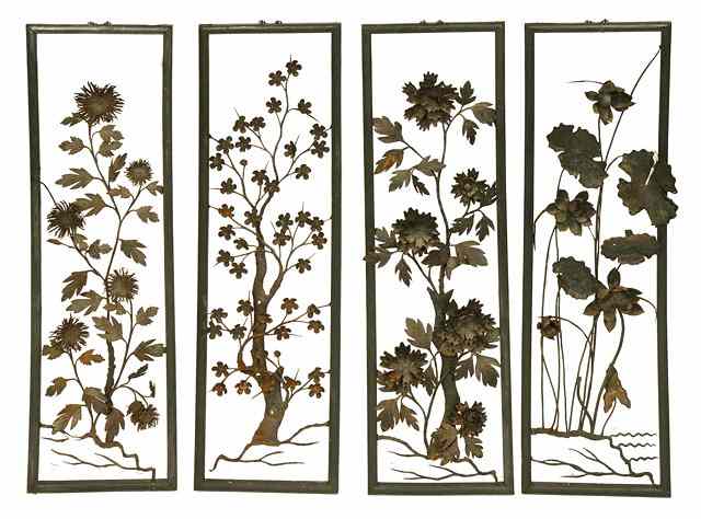 Appraisal: A SET OF FOUR UNUSUAL BEATEN METAL WALL PANELS possibly