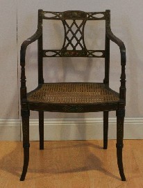 Appraisal: An Edwardian painted and caned mahogany arm chair in the