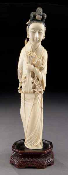 Appraisal: Chinese Qing carved ivory figure International shipping IS NOT available