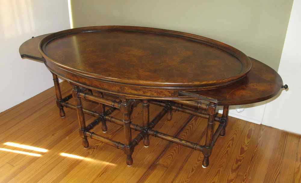 Appraisal: ROBB STUCKY INLAID DRAW LEAF COFFEE TABLE Oval coffee table