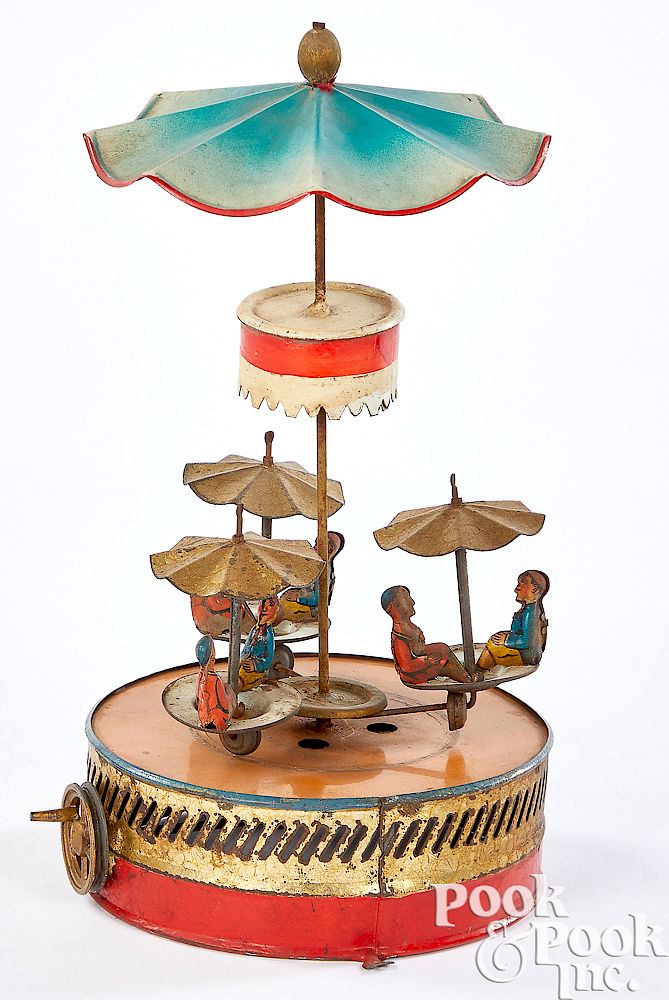 Appraisal: Painted and lithograph tin carousel steam toy Painted and lithograph