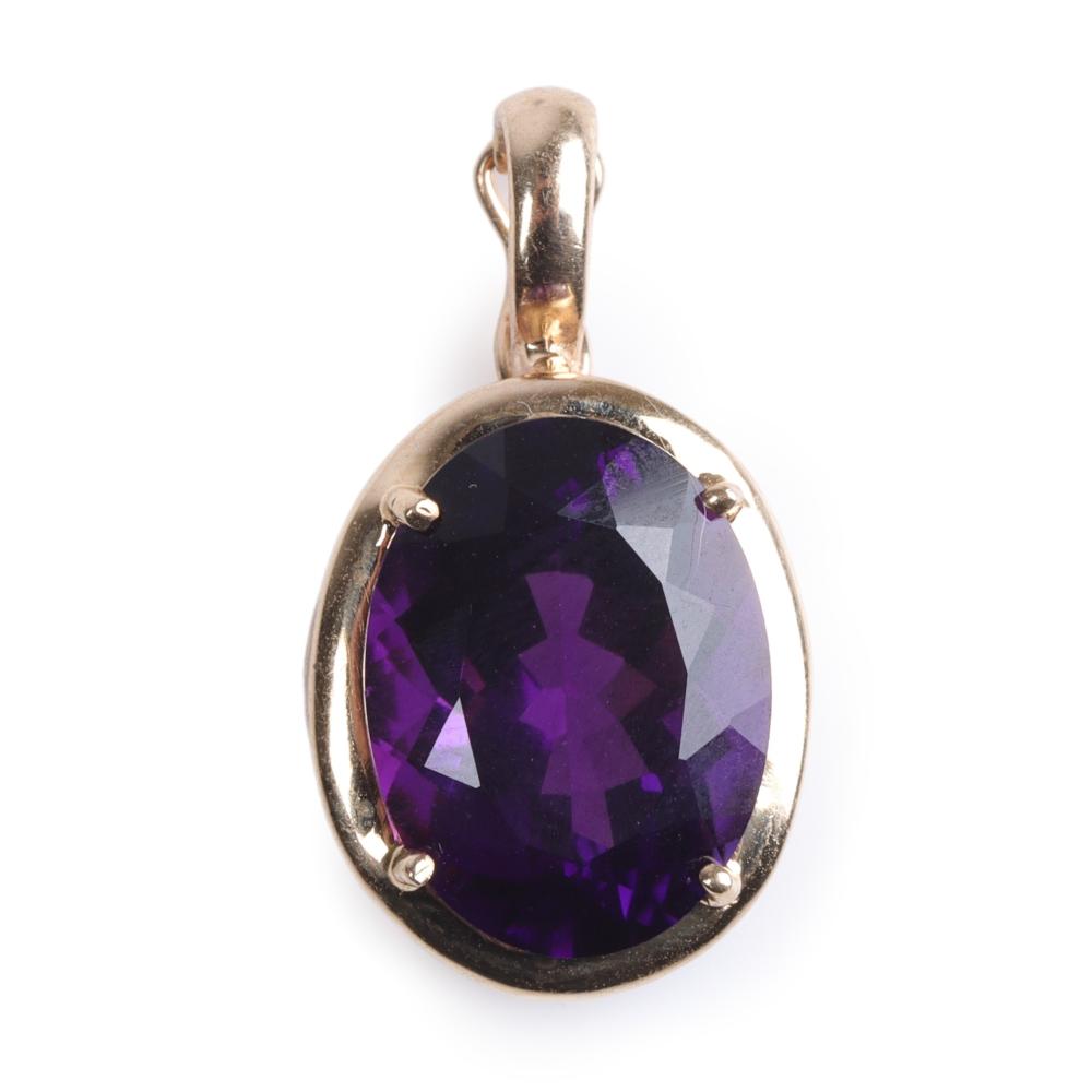 Appraisal: Vintage estate K gold large oval amethyst pendant Stone measures