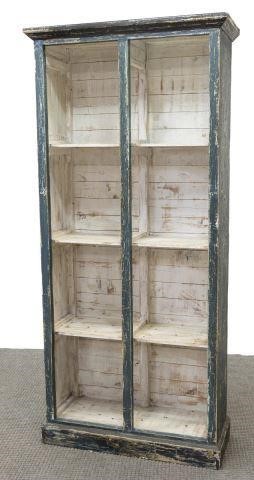 Appraisal: Continental pine bookcase in a distressed painted finish having a