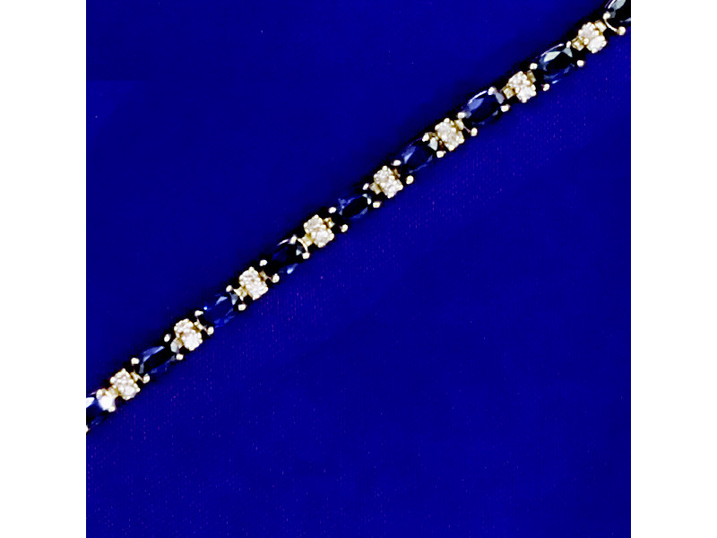 Appraisal: SAPPHIRE AND DIAMOND BRACELET AND EARRING SET Bracelet is k