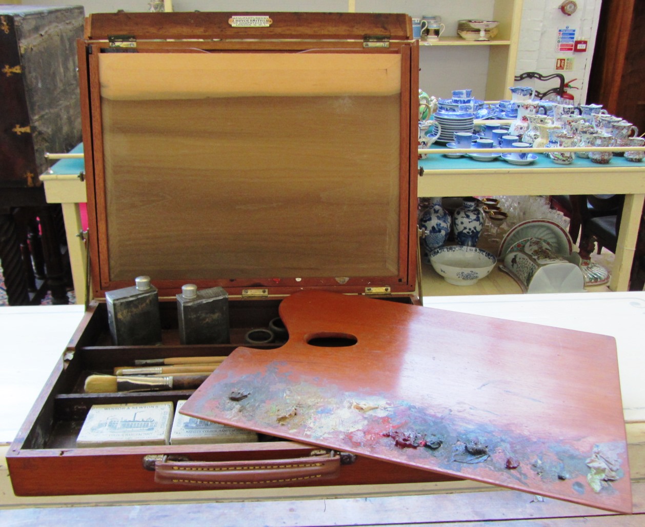 Appraisal: An early th century mahogany cased travelling artists easel and