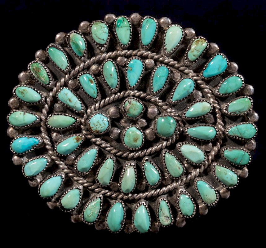 Appraisal: A ZUNI PETTIPOINT STERLING AND TURQUOISE BROOCH Circa early- to