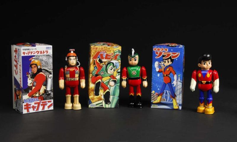 Appraisal: Lot of Tin Superhero Wind-Up Toys Description Japanese Made by