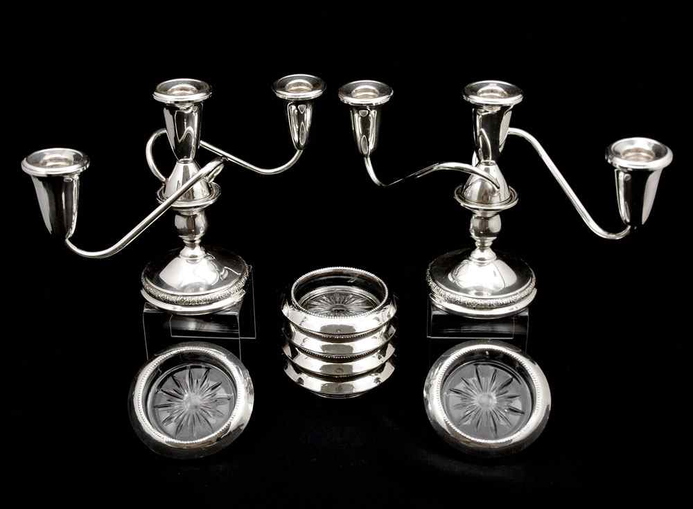 Appraisal: PAIR STERLING CANDELABRA COASTERS To include Pair International Prelude light