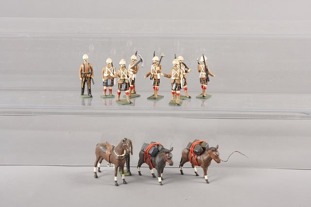 Appraisal: Lot of figures with one horse and mules metal representing