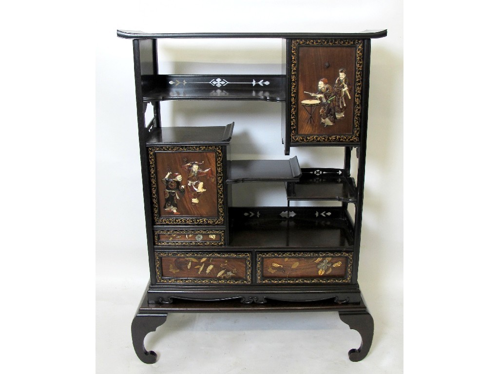 Appraisal: A Chinese hardwood stage cabinet with open shelves above a