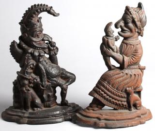 Appraisal: Pair of English Cast Iron Punch Judy Doorstops In typical