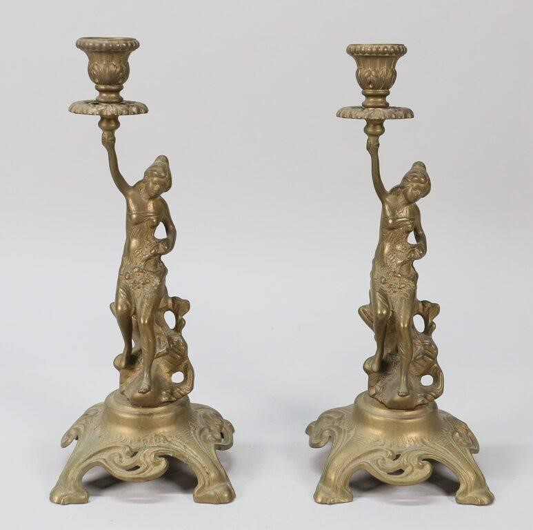 Appraisal: PAIR OF ART NOUVEAU FIGURAL BRASS CANDLESTICKSPair of art nouveau