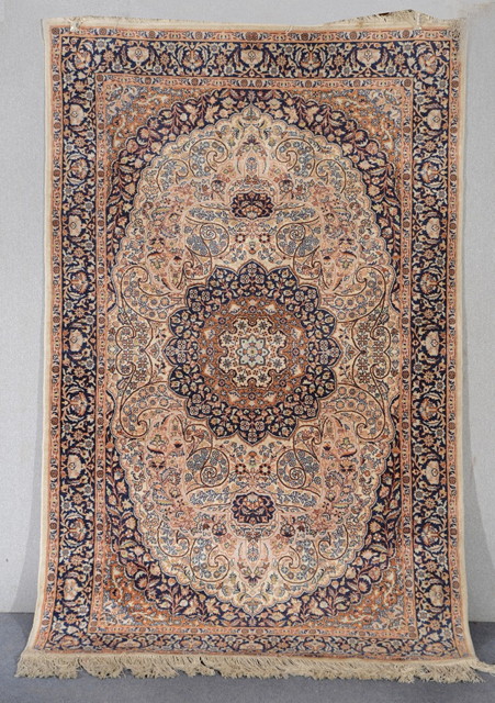 Appraisal: A MODERN PERSIAN WHITE GROUND RUG with central medallion within