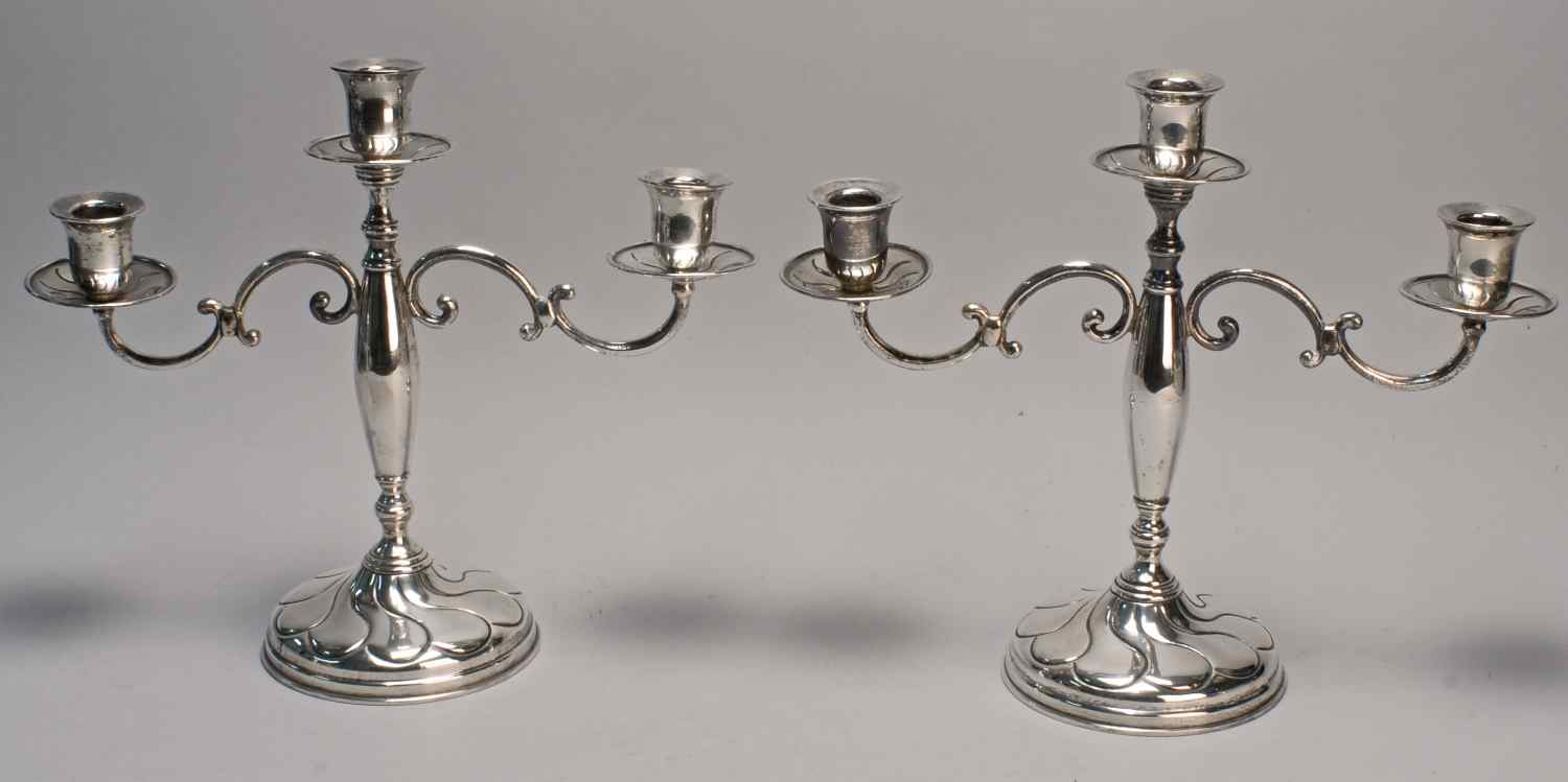 Appraisal: PAIR OF SOUTH AMERICAN FINE SILVER THREE-SOCLE CANDELABRAWith scrolled arms