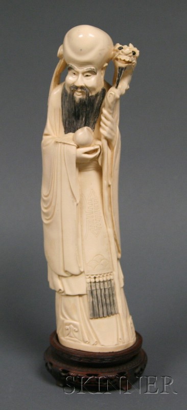 Appraisal: Contemporary Statue of Shao Lao China holding a staff and