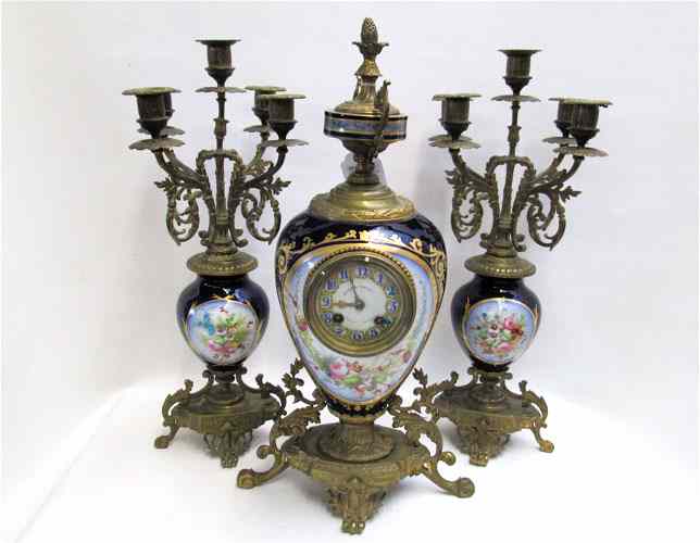 Appraisal: FRENCH ''SEVRES'' THREE PIECE CLOCK SET The centerpiece clock with