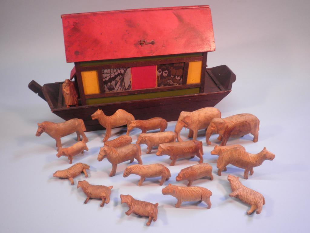 Appraisal: A painted ark containing carved wooden animals mostly pine