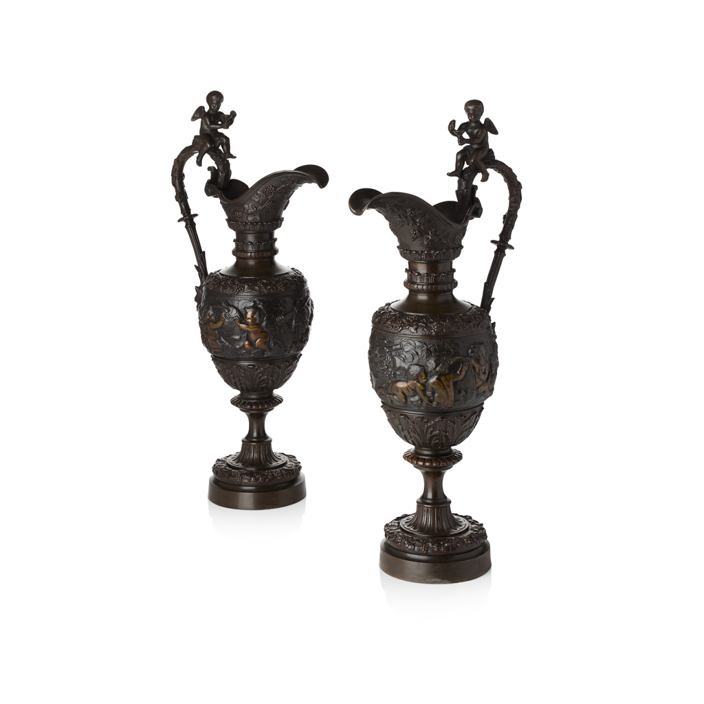 Appraisal: AFTER CLODION PAIR OF LARGE CONTINENTAL BRONZE EWERS TH CENTURY