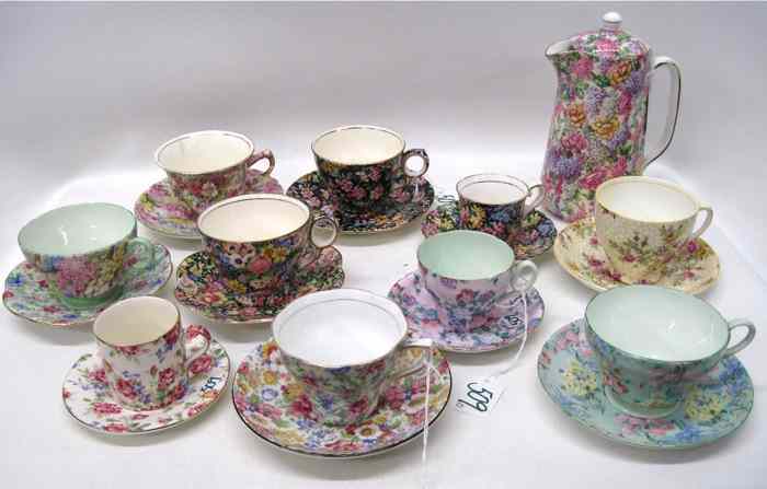 Appraisal: COLLECTION PORCELAIN CHINTZ TEACUPS SAUCERS and coffee pot pieces Includes