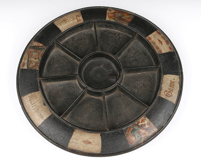 Appraisal: A POPE JOAN PAPIER MACH CIRCULAR BOARD with painted decoration