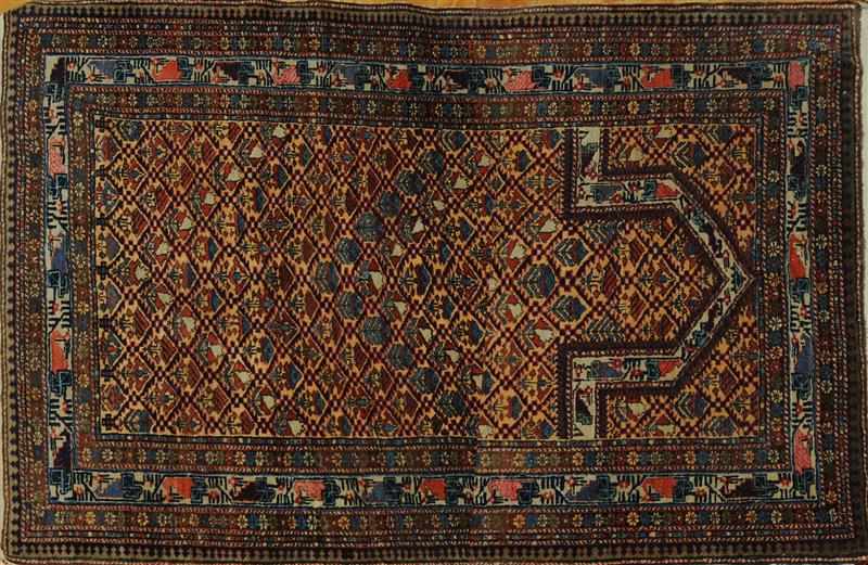 Appraisal: CAUCASIAN PRAYER RUG The saffron field with diamond trellis and