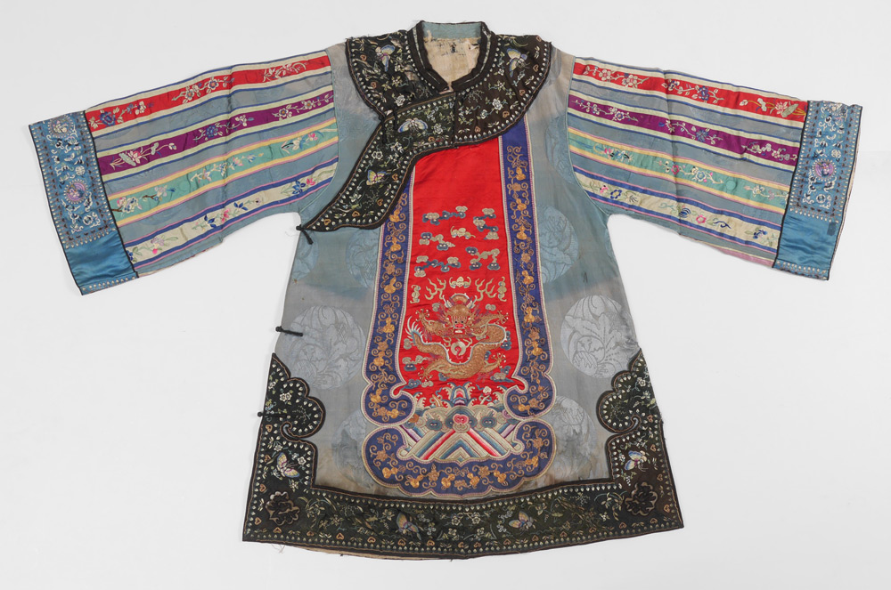 Appraisal: CHINESE SILK EMBROIDERED DRAGON ROBE Collar with butterflies and flower