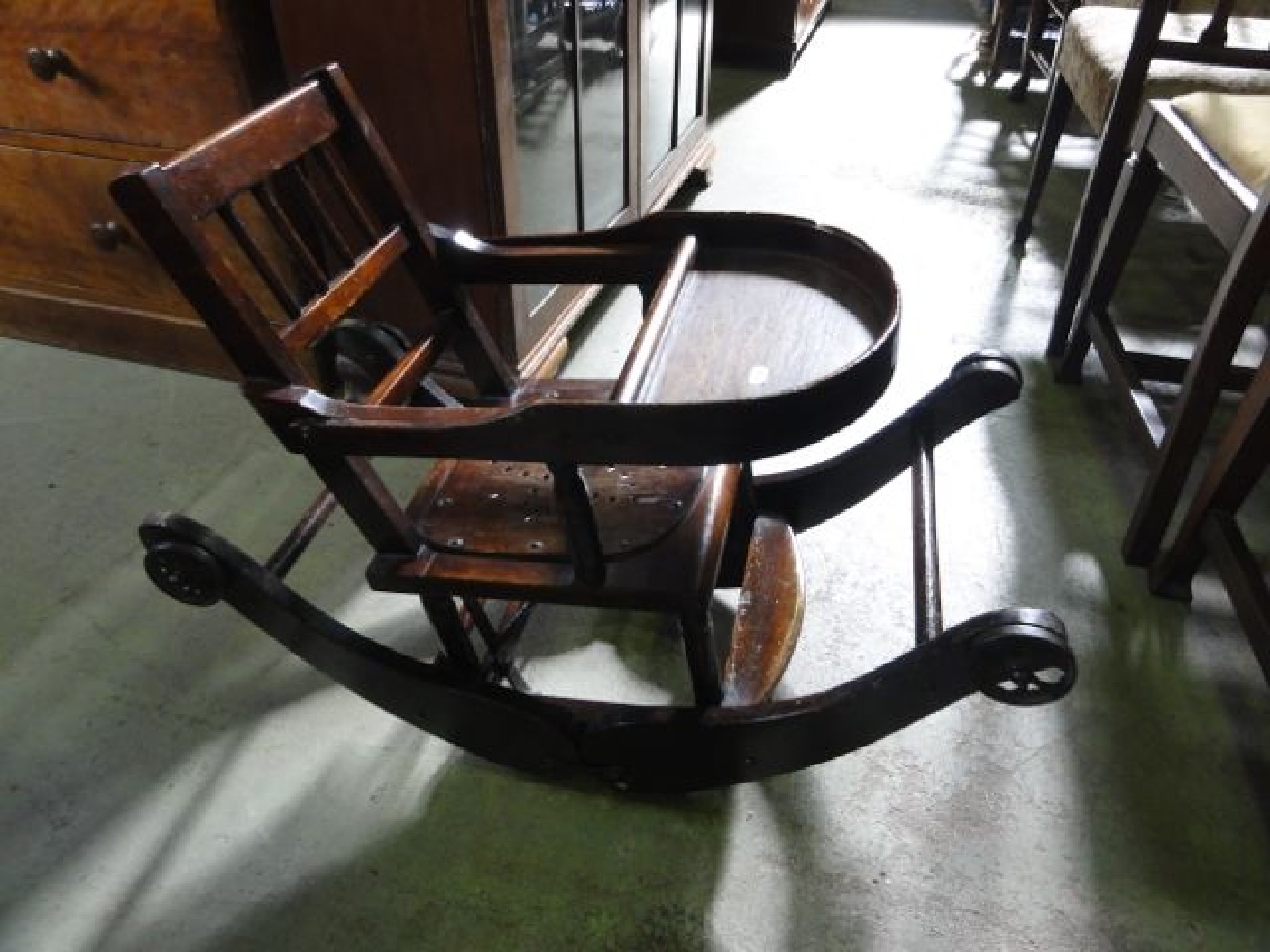 Appraisal: An Edwardian stained beechwood metamorphic child's high chair