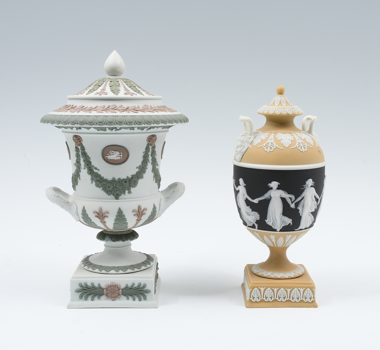 Appraisal: ANTIQUE TRI-COLOR WEDGWOOD COVERED URNS Comprising - Rare tri-colored Jasperware