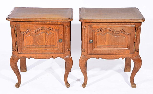 Appraisal: A PAIR OF FRENCH OAK POT CUPBOARDS each with single