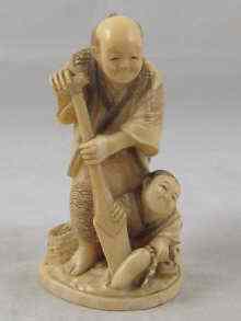 Appraisal: A good th c Japanese ivory group of a gardener