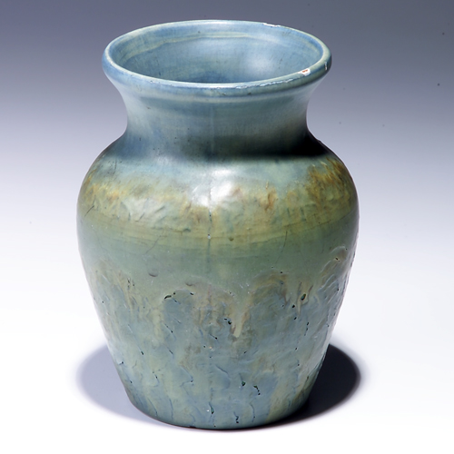 Appraisal: PETERS AND REED bulbous vase decorated with landscape Bursts some