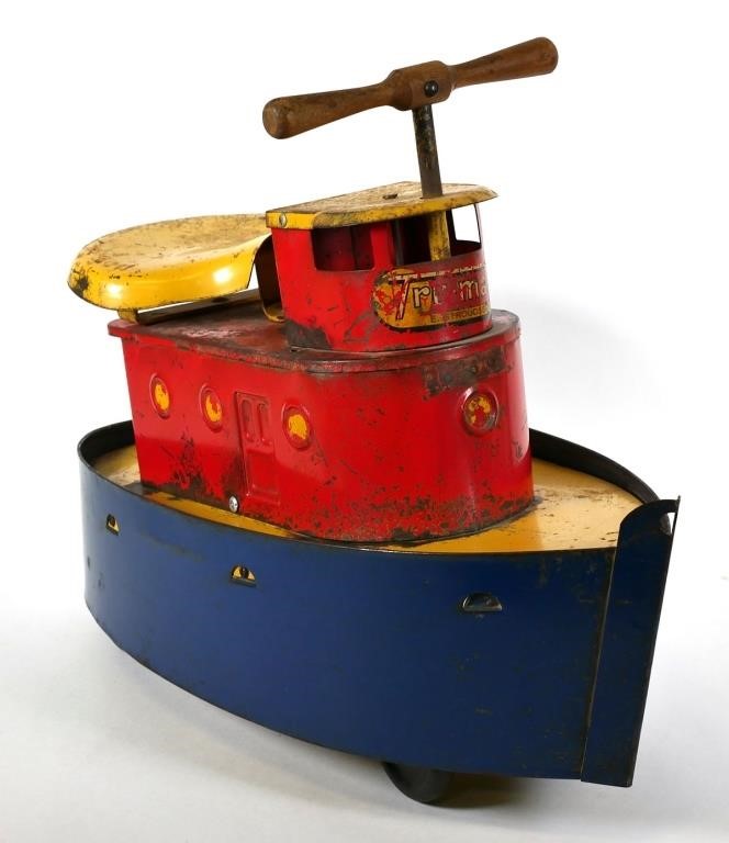 Appraisal: ANTIQUE PRESSED STEEL TRUMATIC RIDE-ON TUGBOATTrumatic Ride on Tugboat boat