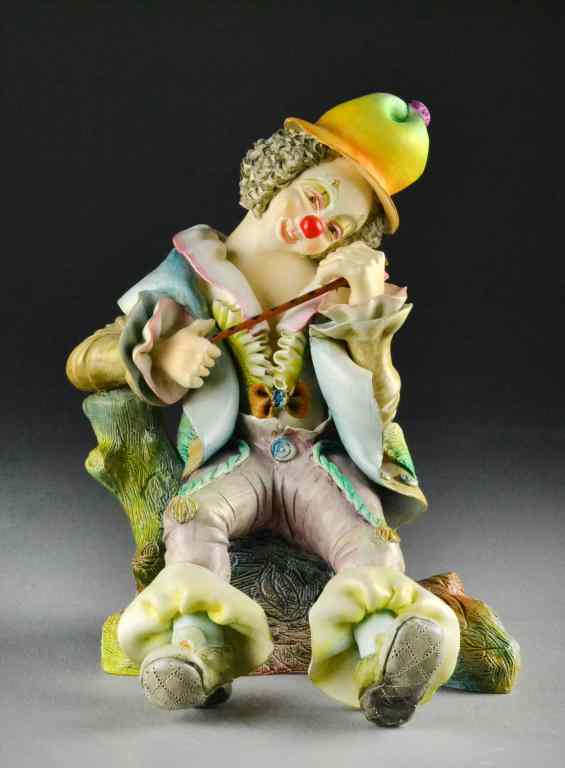 Appraisal: Whimsical Clown Figure - signed TuzmanDepicting a seated pensive clown