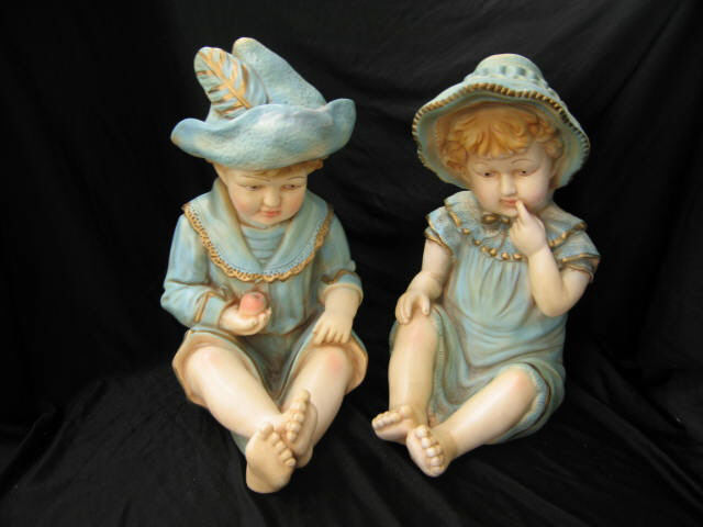 Appraisal: Pair of Piano Babies Chalkware Figurines boy girl