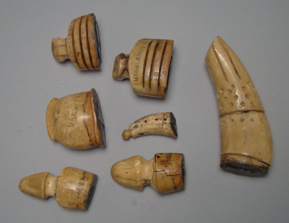 Appraisal: SEVEN CARVED WHALE IVORY WHALE STAMPS Early th century copies