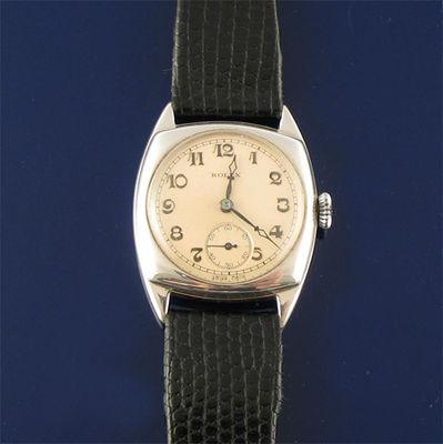 Appraisal: Rolex a gentleman's silver cushion-shaped wristwatch c the pale cream