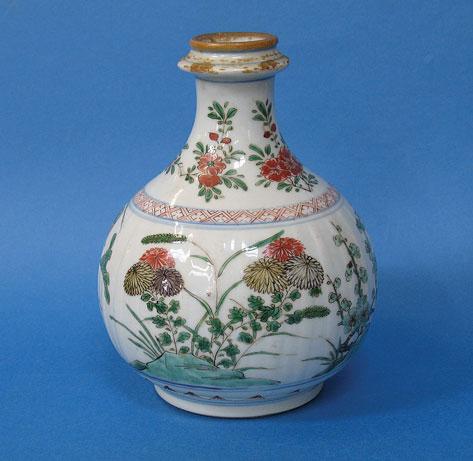 Appraisal: A CHINESE FAMILLE VERTE VASE of globular form the fluted