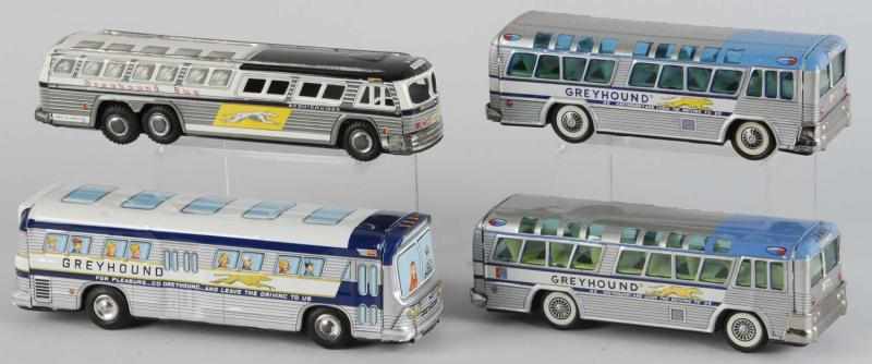 Appraisal: Lot of Tin Greyhound Bus Friction Toys Description Japanese Working