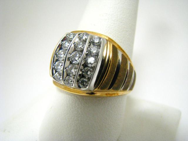 Appraisal: Gentleman's K yellow gold ring with channel set diamonds ct