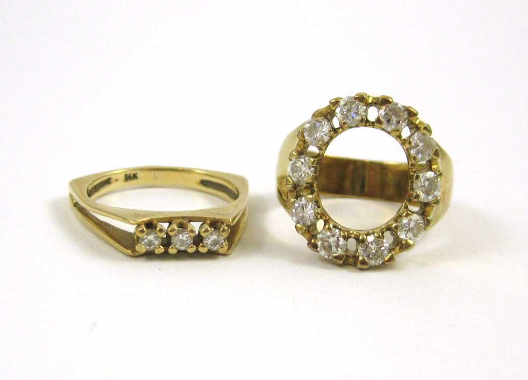 Appraisal: TWO DIAMOND AND FOURTEEN KARAT GOLD RINGS including a size