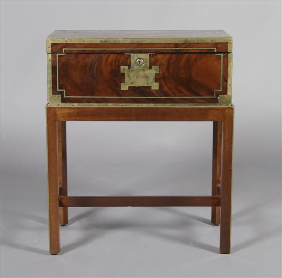 Appraisal: An English Brass Mounted Trunk Table Height of box x